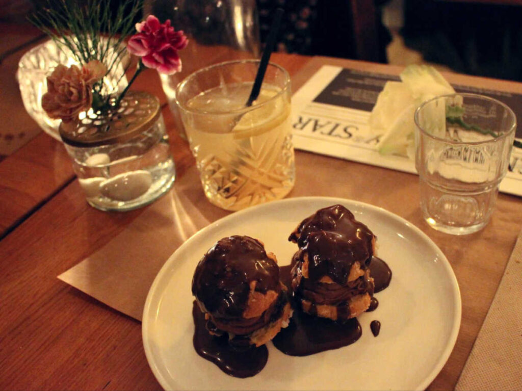 A plate with eclairs from La Maison Rose