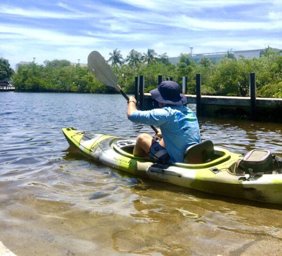 The author on an eco-paddle in Wilton Manors