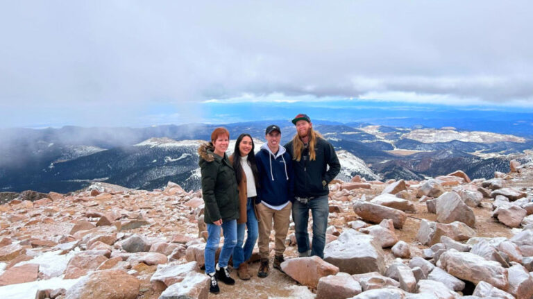 Travel Lemming editor Abigail and her family at the Pikes Peak summit