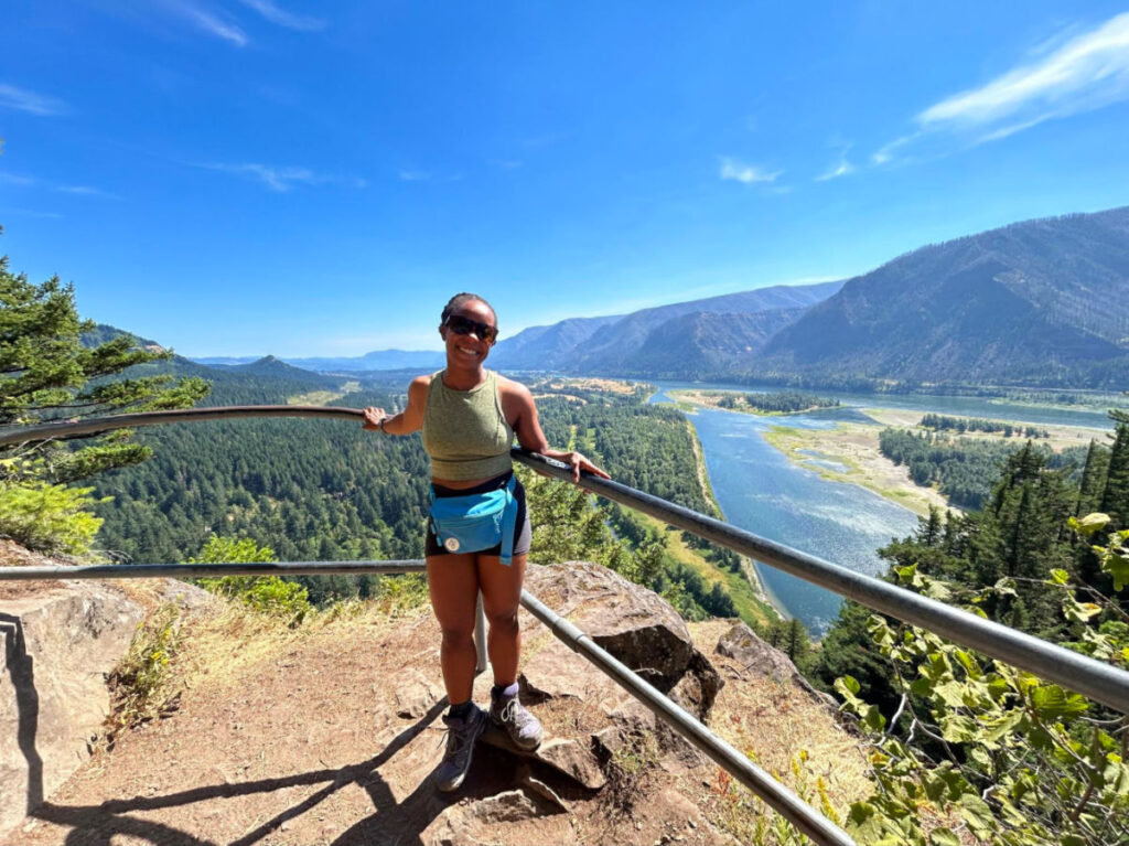 Travel Lemming editor Chelsea standing at the top of Beacon Rock