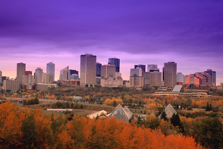 A photo of downtown Edmonton Alberta Canada in fall as the sun sets in the background