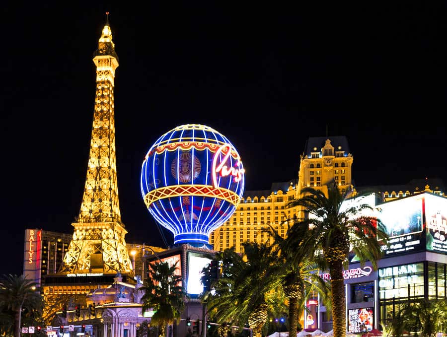 Illuminated Eiffel Tower and Paris sign in a globe of the Vegas Strip at night