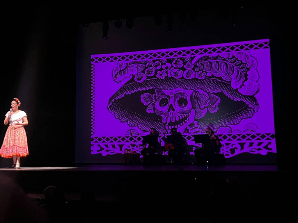 A performer singing at El Museo del Barrio