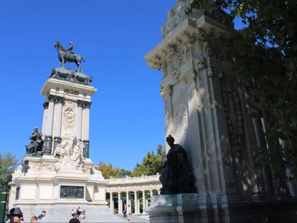 Clear blue sky over the monuments in El Retiro Park