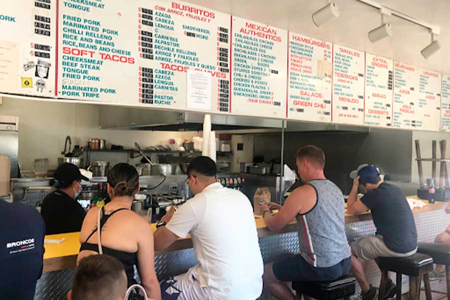 People enjoying their meal in El Taco de Mexico