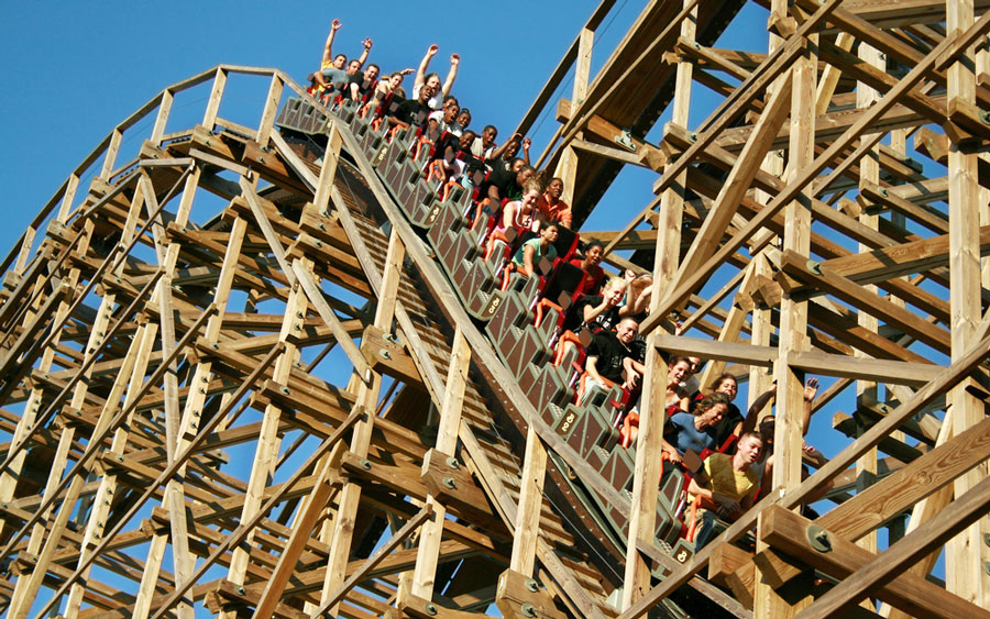 View of people riding the wooden rollercoaster in Six Flags Great Adventure