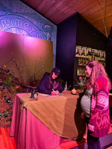 The author Elizabeth Demolat getting an autograph from Kacey Musgraves at Grimey’s
