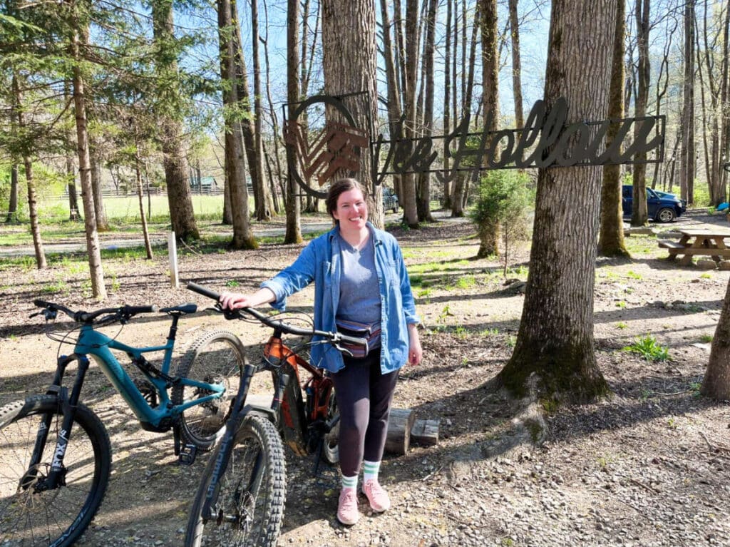 The author Elizabeth Demolat posing with the bicycles in Vee Hollow