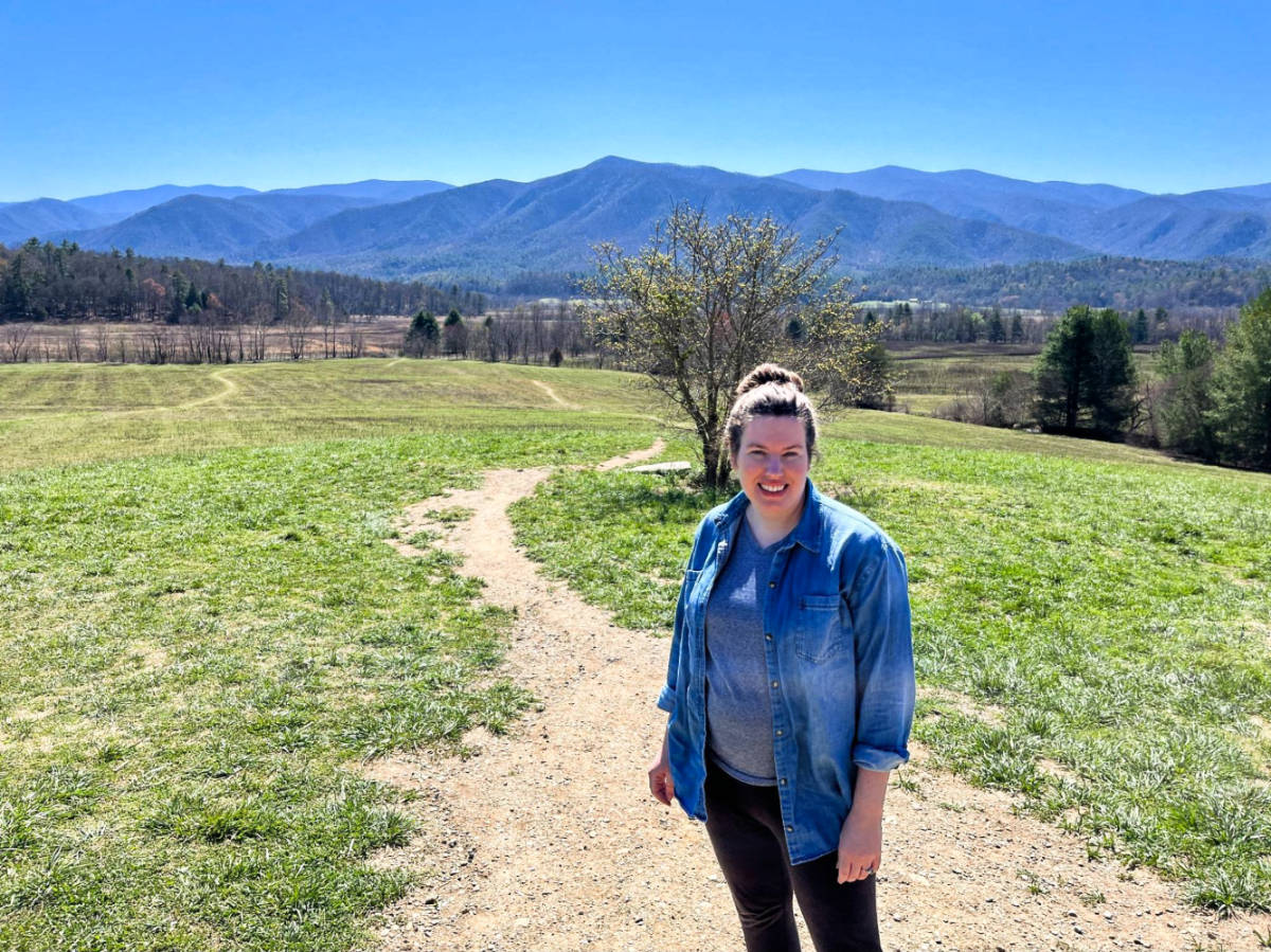 The author, Elizabeth Demolat, posing in the middle of the trail in Great Smoky Mountains National Park