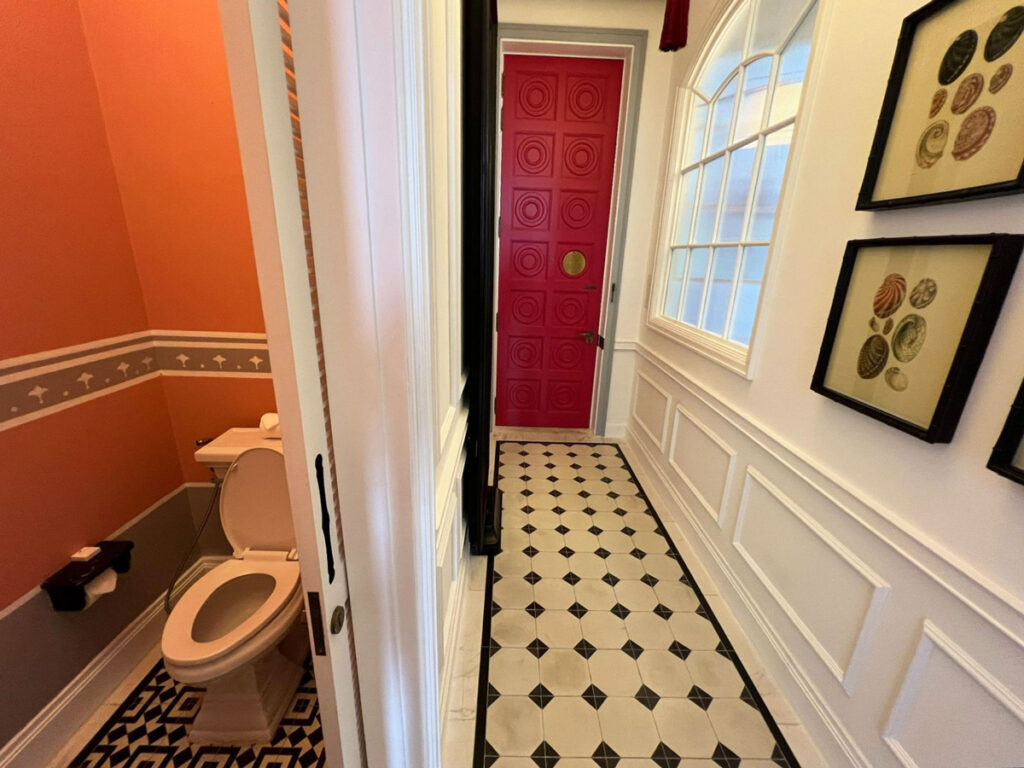 View of the separated toilet room and the hallway at the Emerald Bay View room