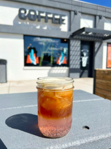 A glass of paloma-inspired espresso drink at Queen City Collective Coffee