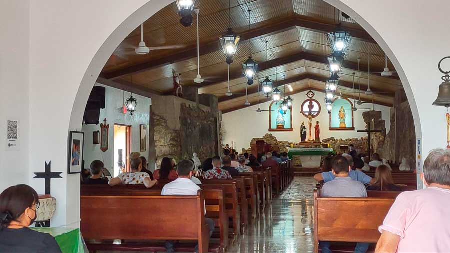 View of people inside Ermita de Espinar