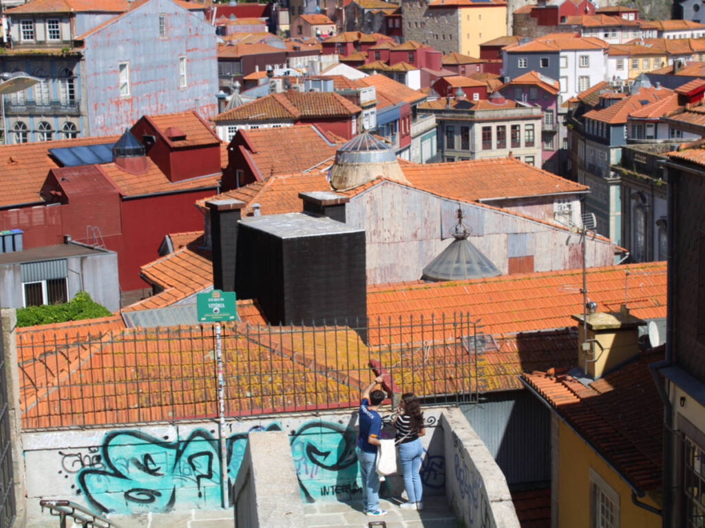 A couple looking at the views at Escadas da Vitória