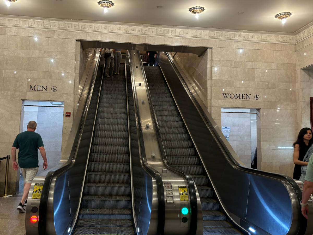 View of the restrooms at the each side of the escalator in Grand Central