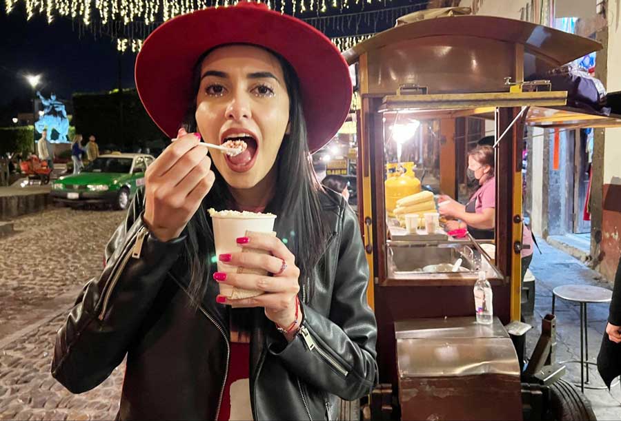 Clara eating Esquites in San Miguel de Allende