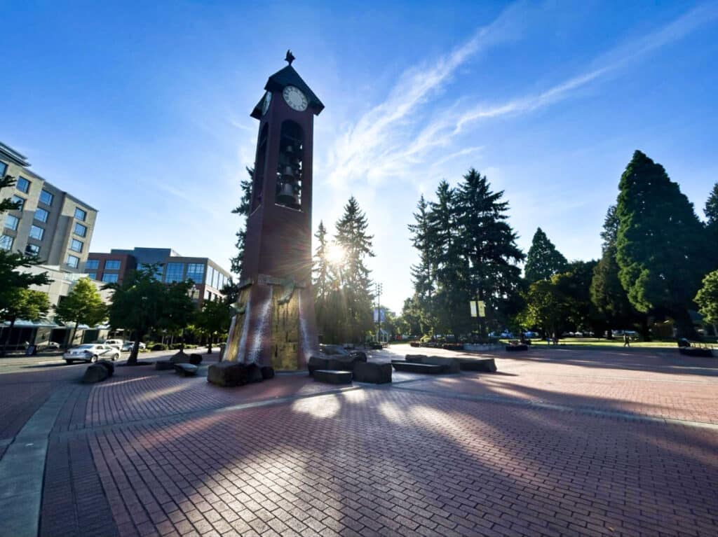 View of the Salmon Run Bell Tower under the shade in Esther Short Park