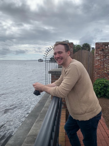 Ethan Thoren smiling for a photo at the Cummer Museum and Gardens, Jacksonville, FL