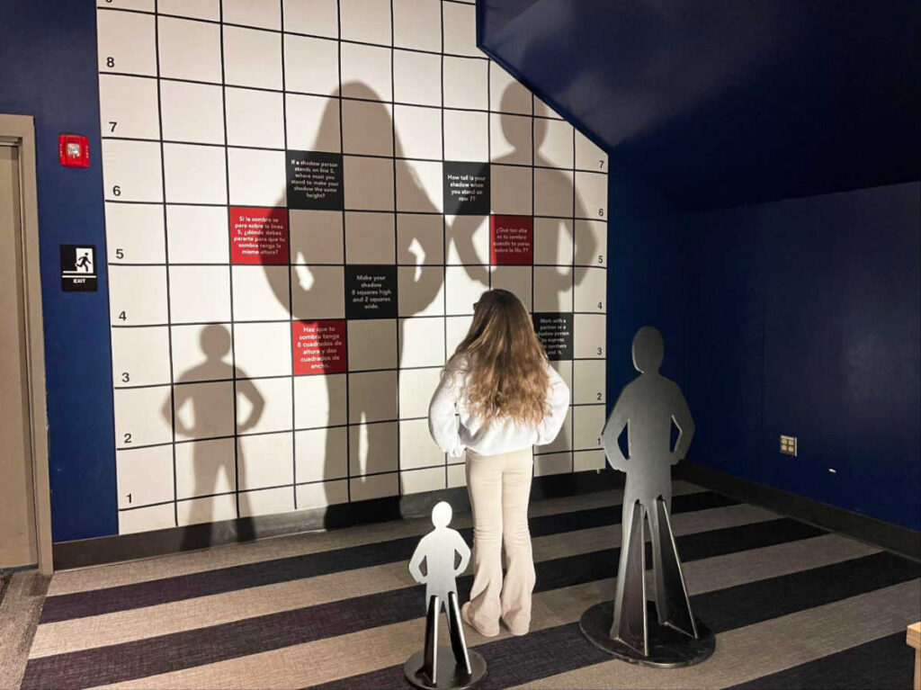 The author's daughter at an exhibit in the Museum of Science