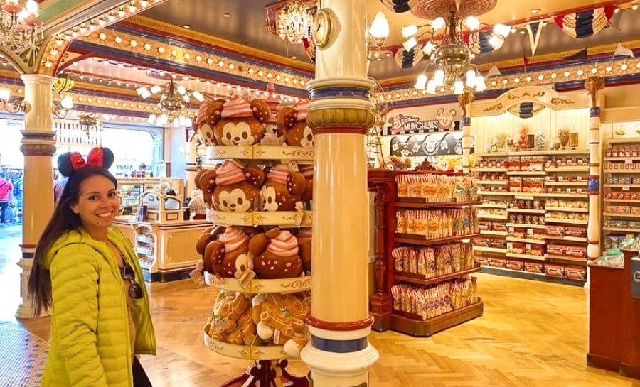 The author McKenna Mobley posing inside the souvenir shop in Disneyland