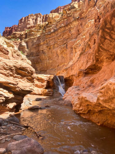 Picturesque view of a waterfall between the rocks in Capitol Reef National Park