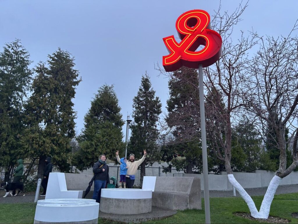A family posing for a photo at the SAM’s Olympic Sculpture Park