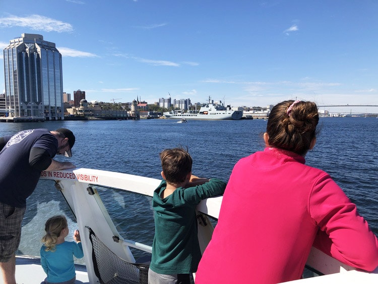 Kids aboard the Halifax-Dartmouth Ferry looking at the city