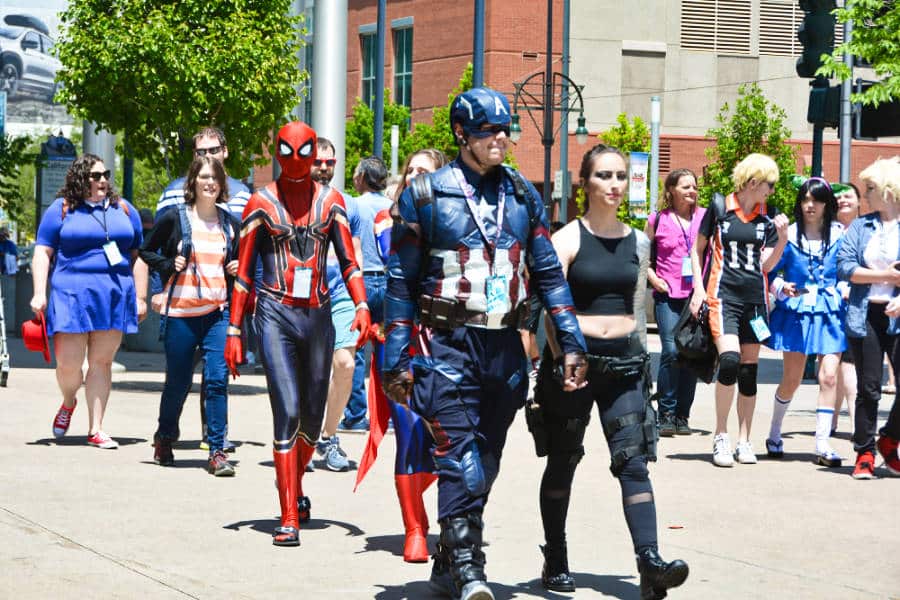 View of people wearing costumes during the parade on Fan EXPO Denver