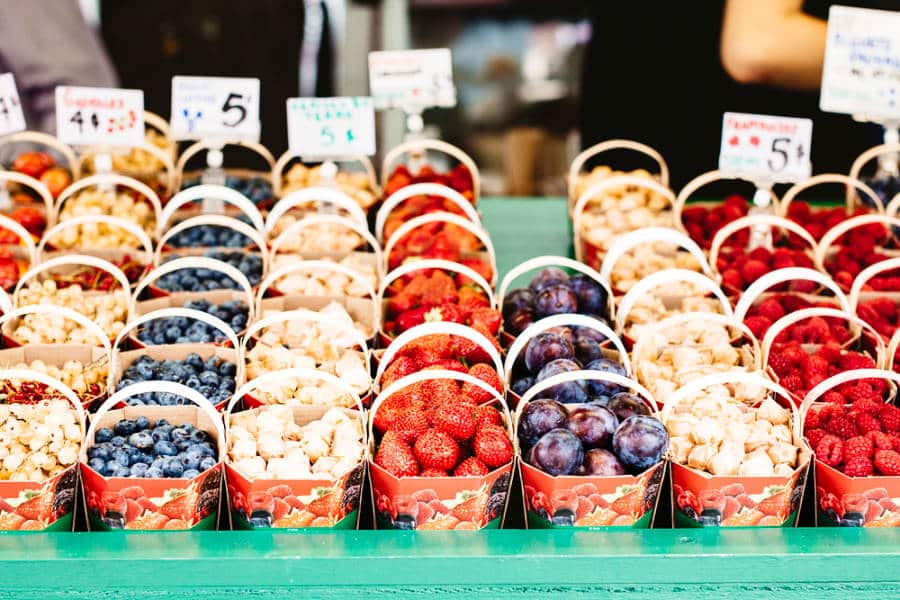 Different fresh fruits on a small basket at the local market