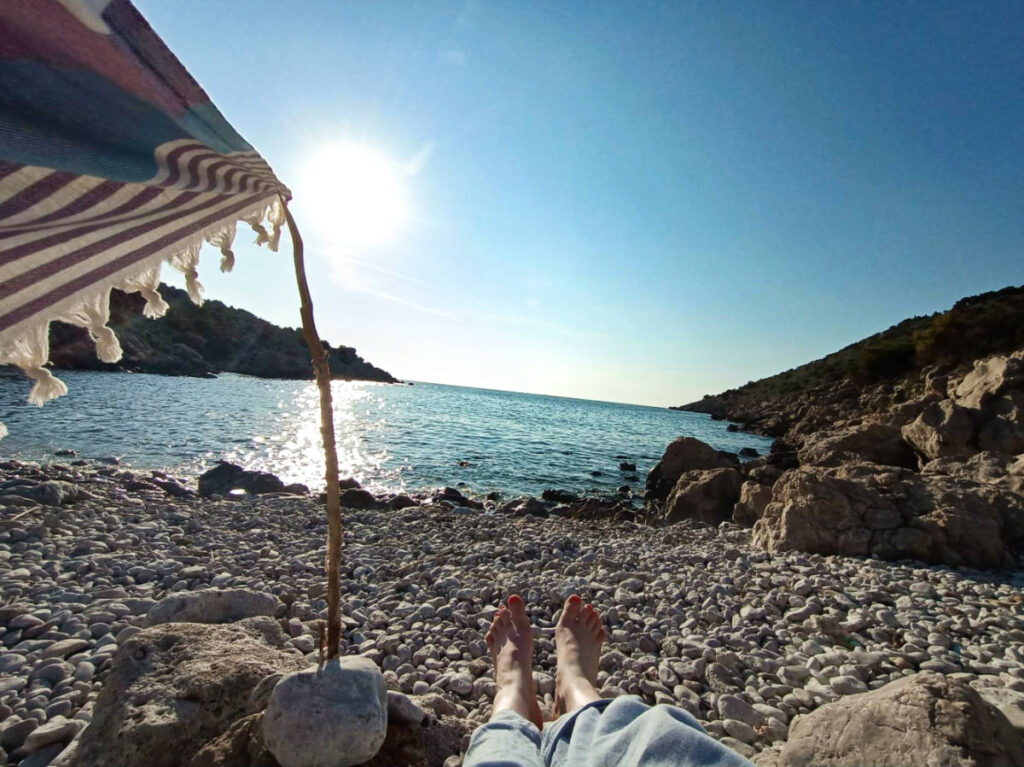 The feet sun bathing near the beach in Bar, Montenegro