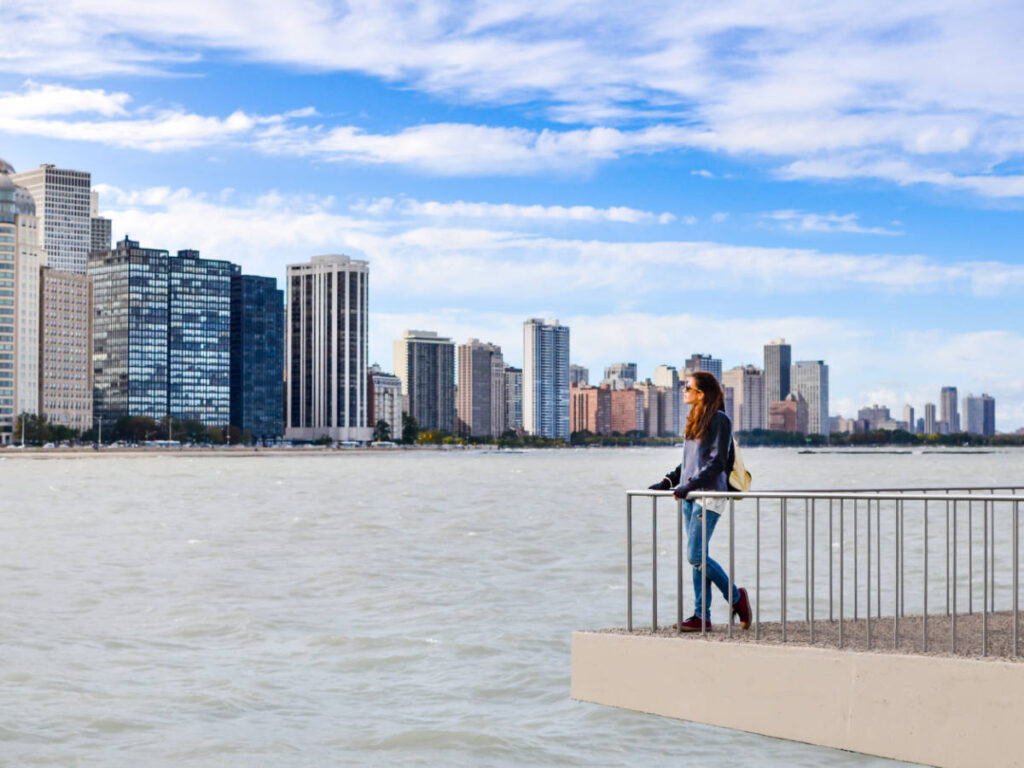 A solo female traveler admiring the city skyline view