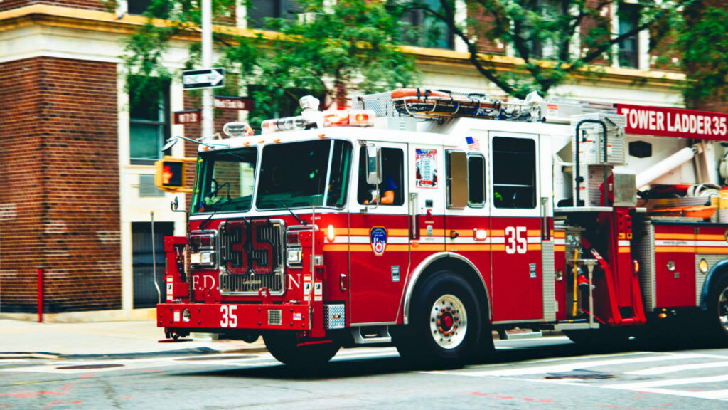 A firetruck driving on the highway