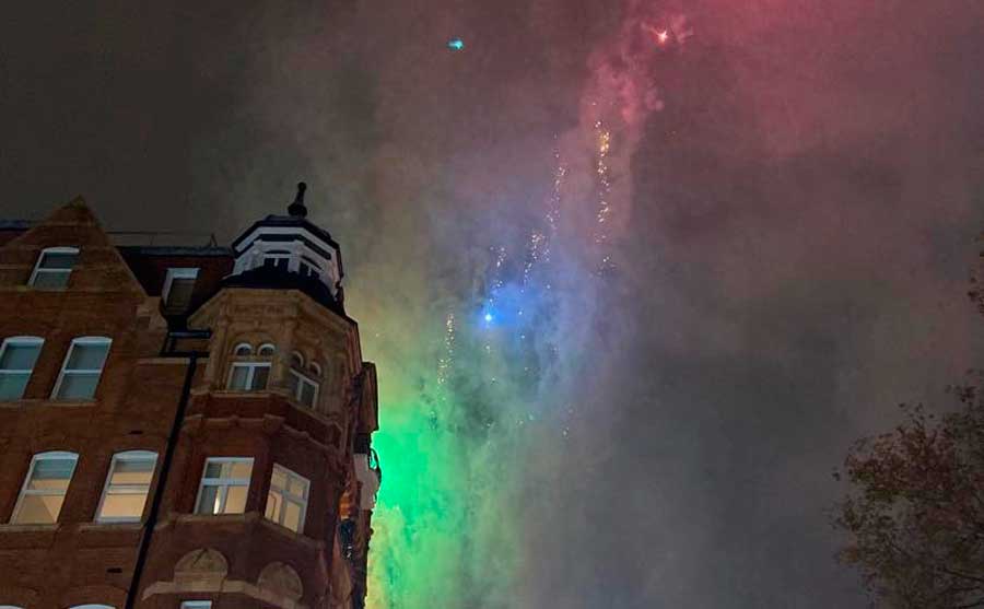 Colorful fireworks up in the night sky of Sloane Square