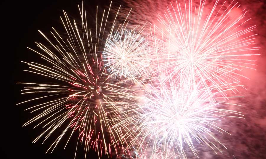 Colorful fireworks on the night sky of Disneyland