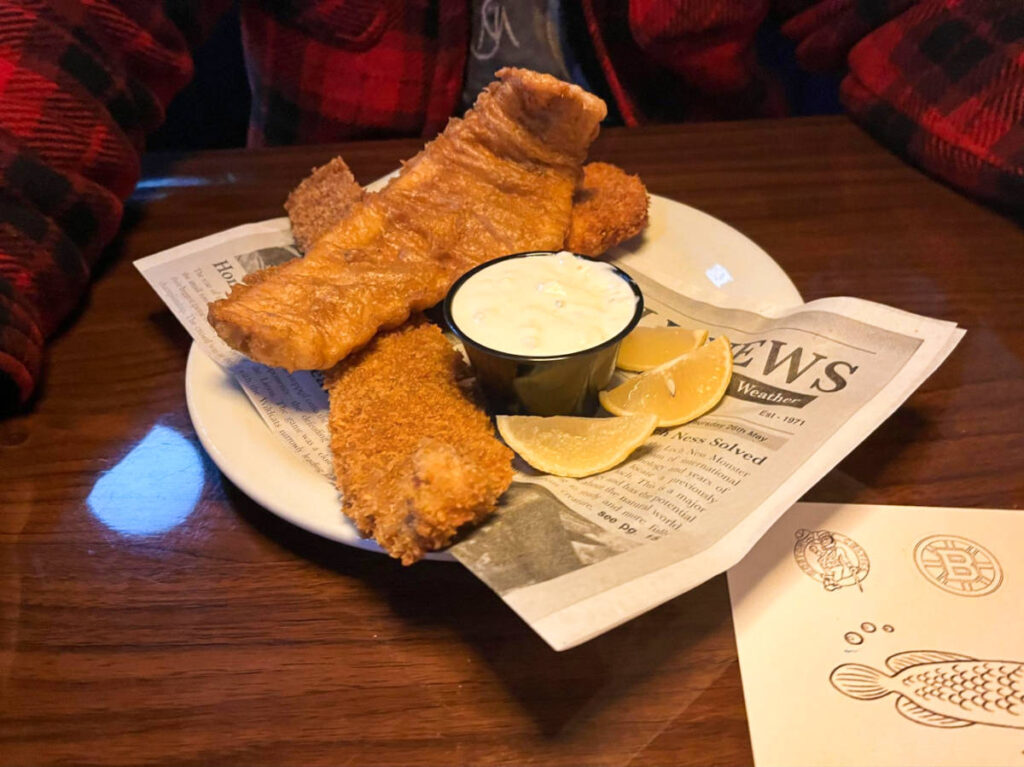 A plate with fish and chips from Boston Commons