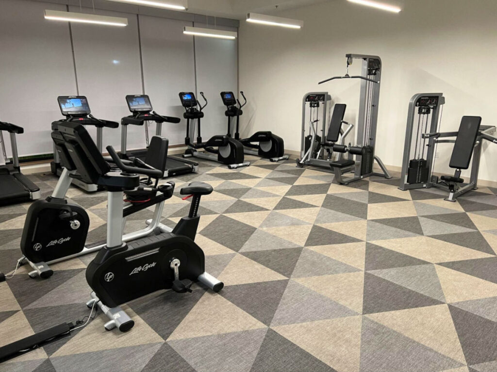 A room with variety of exercise equipment and machines at Element Denver Downtown East
