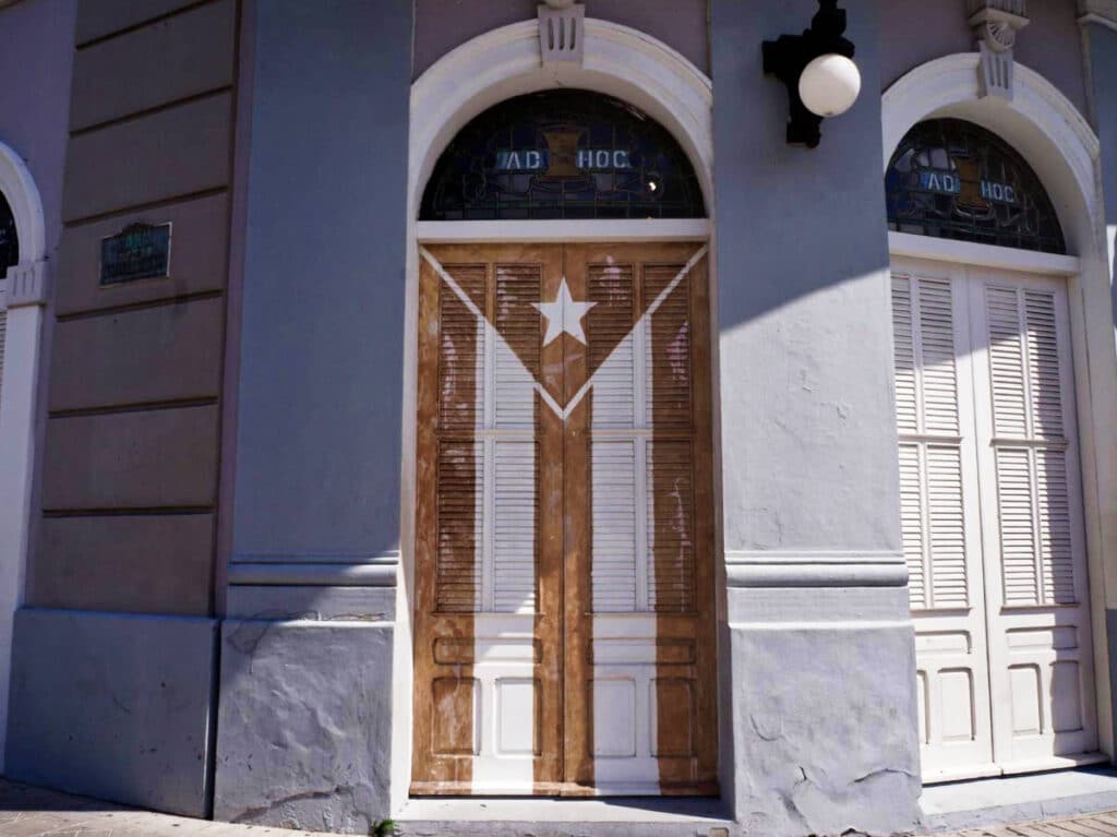 A Puerto Rican flag painted on one of the doors in downtown Ponce