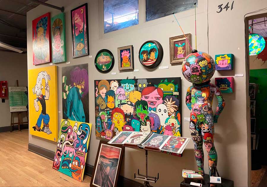 Colorful arts displayed inside Flat Iron Arts Building