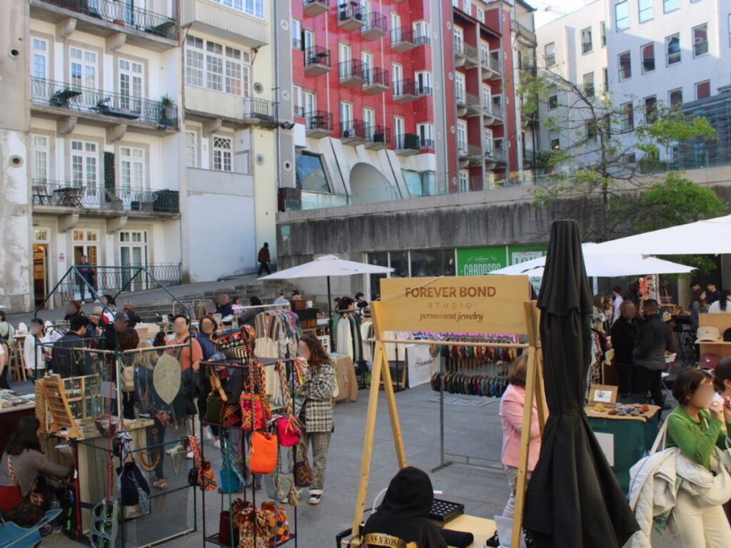 People shopping at a Flea market in Porto