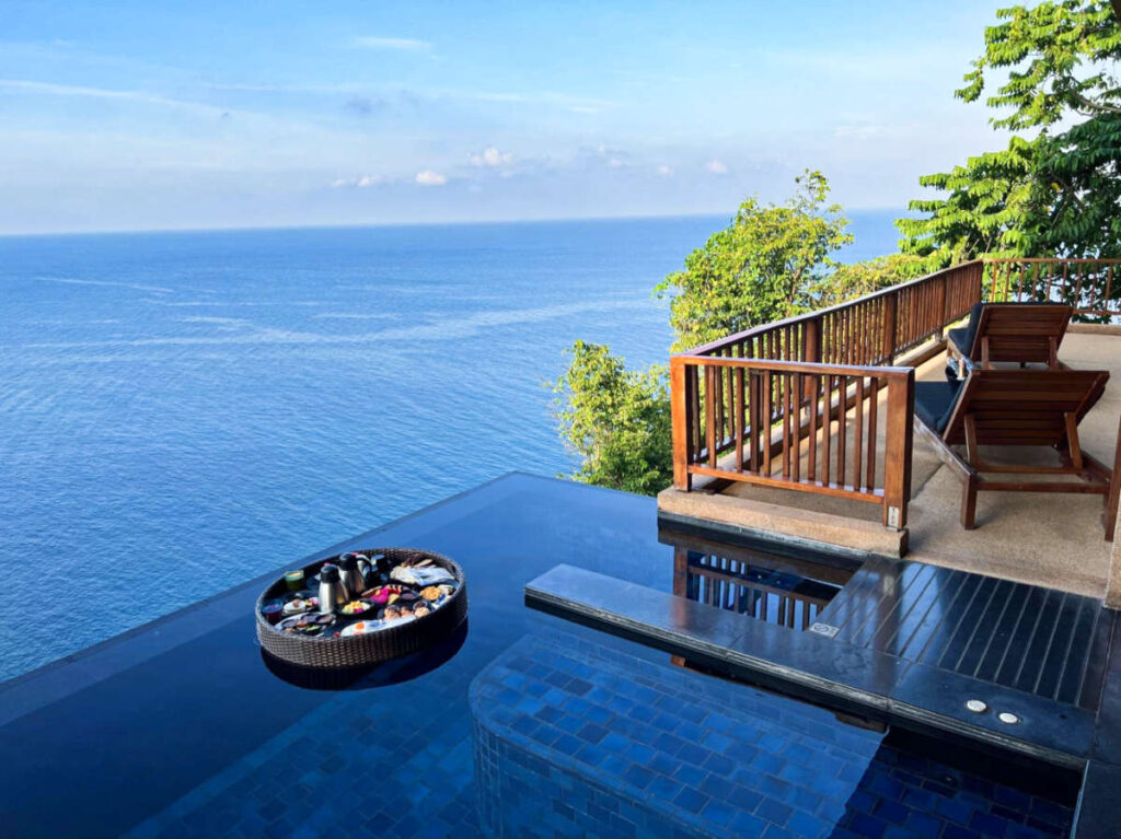 A floating breakfast on the infinity pool of Paresa Resort Phuket