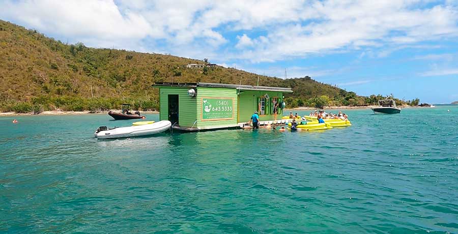 People in their boats buying at the floating taco bar in Coral Bay