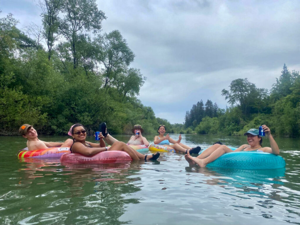 Author Laura and her friends floating on the Russian River