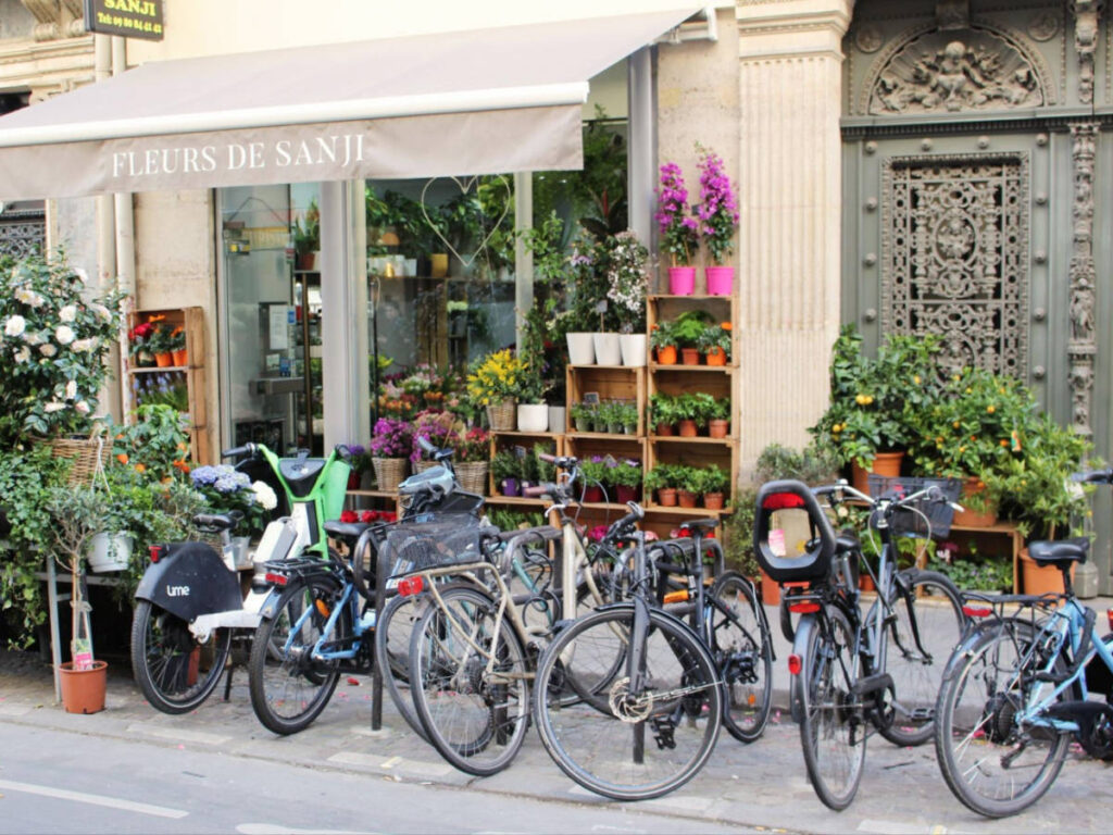 Bicycles parked in front of a flowers shop in Notre-Dame-des-Champs area