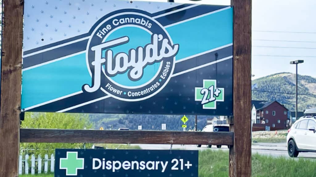 Signage of Floyd's dispensary near the road