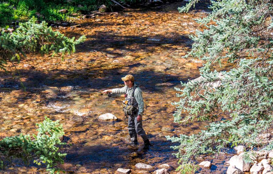 View of a man fishing in Vail