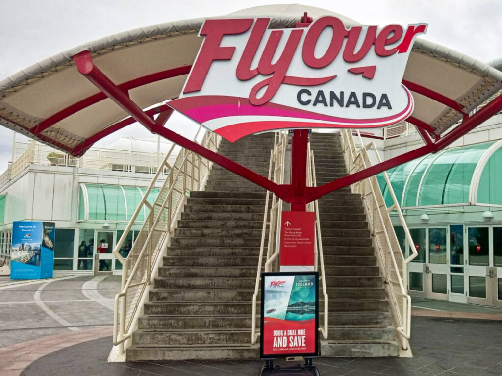 View of the staircase and logo of Fly Over Canada