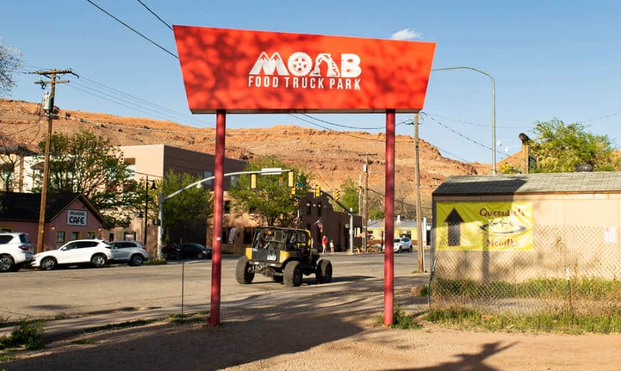 View of the landmark arch sign of Moab Food Truck Park