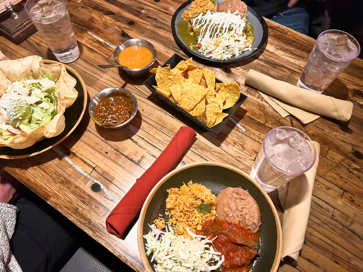 A table with variety of food from Casa Bonita