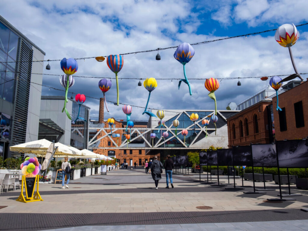 Colorful decorations adorn a vodka factory turned commercial center of Praga