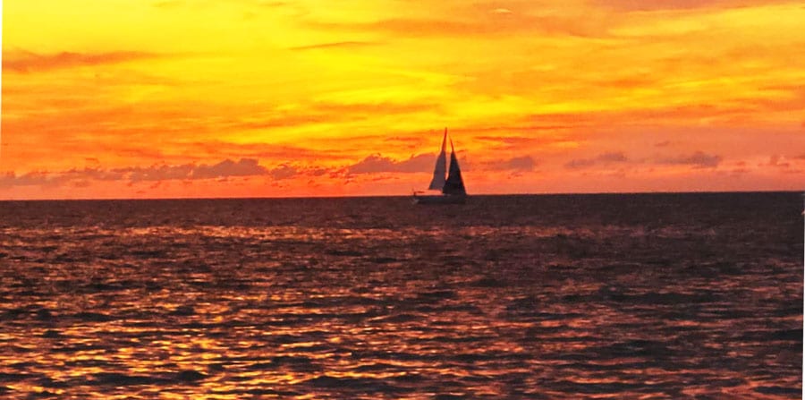 View of a sailing boat in Fort Myers during sunset