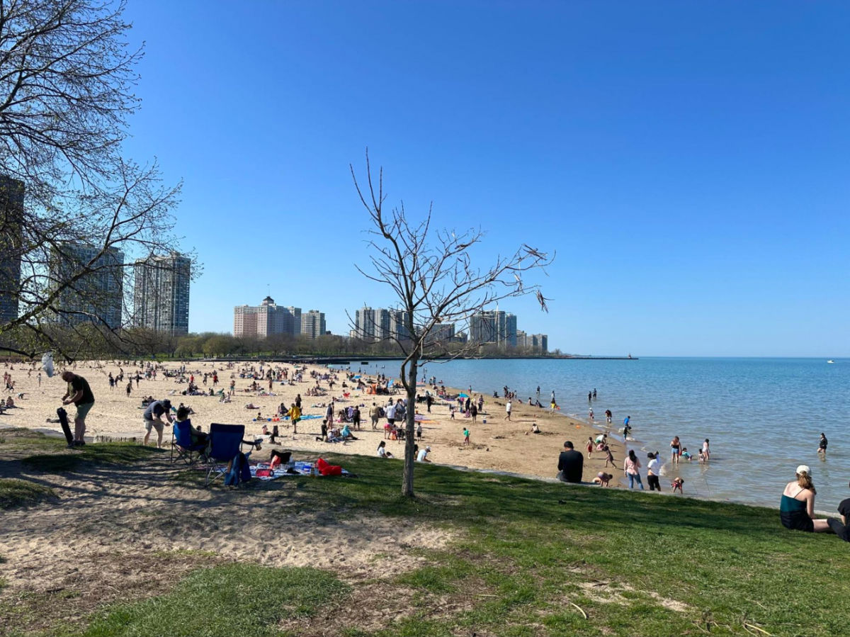 People enjoying sunny day at Foster Beach in spring